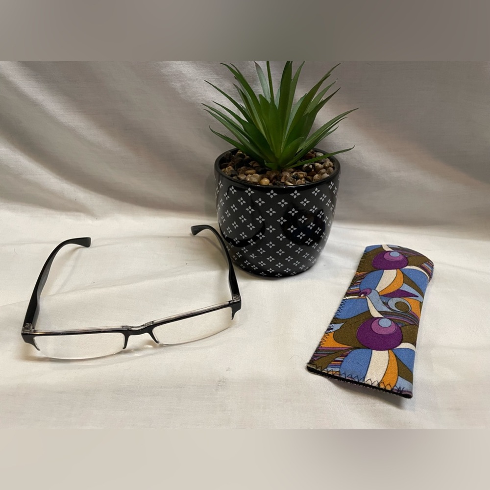 3.25 strength reading glasses with case.